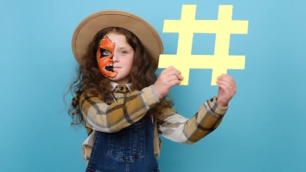 Adorable Little Girl Kid Halloween Mask Holding Big White Hashtag — Stock Video