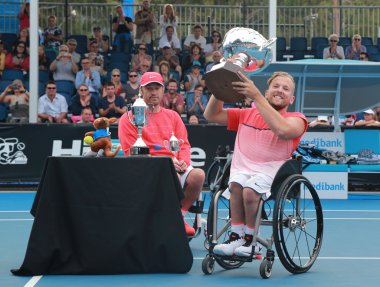 Grand Slam champion Dylan Alcott of Australia posing with trophy after Australian Open 2016 quad wheelchair singles final