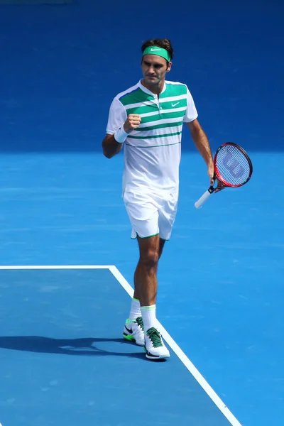 17 gange Grand Slam mester Roger Federer of Switzerland i aktion under kvartfinalen ved Australian Open 2016 - Stock-foto