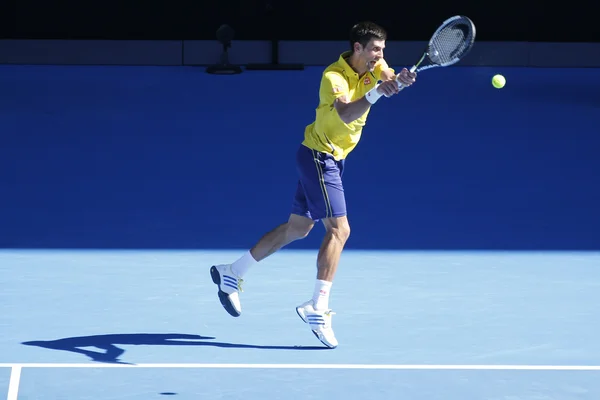 Once veces campeón del Grand Slam Novak Djokovic de Serbia en acción durante su partido de ronda 4 en el Abierto de Australia 2016 — Foto de Stock