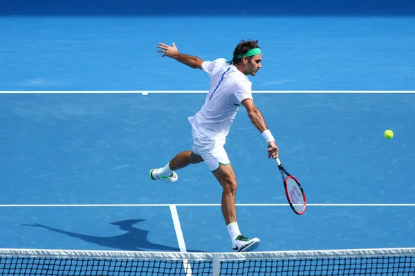 17 gange Grand Slam mester Roger Federer of Switzerland i aktion under kvartfinalen ved Australian Open 2016 - Stock-foto