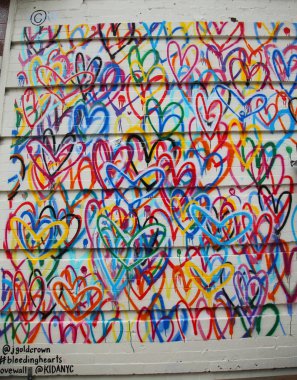 Bleeding Hearts Lovewall mural by artist JGoldcrown in Soho in Manhattan.