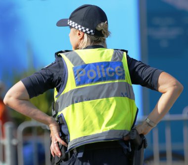 Victoria Police Constable providing security at Olympic Park in Melbourne clipart