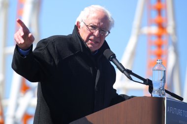 Presidential candidate Bernie Sanders speaks during rally at iconic Coney Island boardwalk in Brooklyn clipart