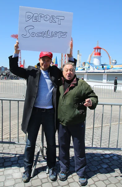Donald Trump supporters protest against presidential candidate Bernie Sanders during his rally at iconic Coney Island boardwalk in Brooklyn