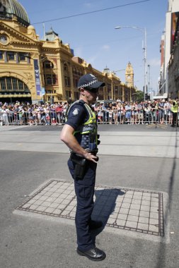 Victoria Police Constable providing security during Australia Day Parade in Melbourne  clipart