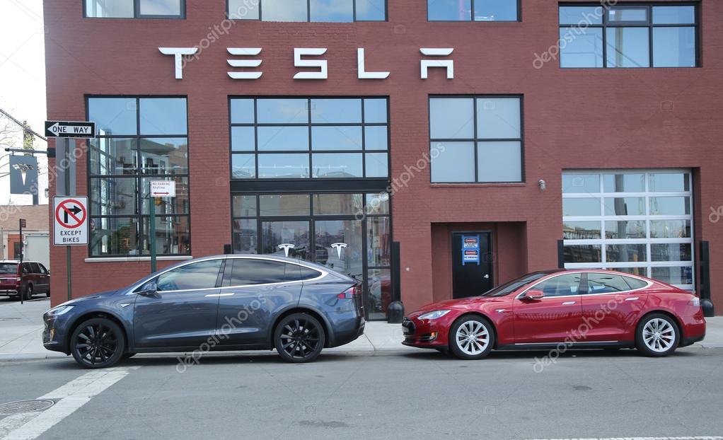 BROOKLYN, NEW YORK - APRIL 23, 2016: Tesla Model X (L) and Model S in the front of new Tesla dealership at Red Hook in Brooklyn, New York
