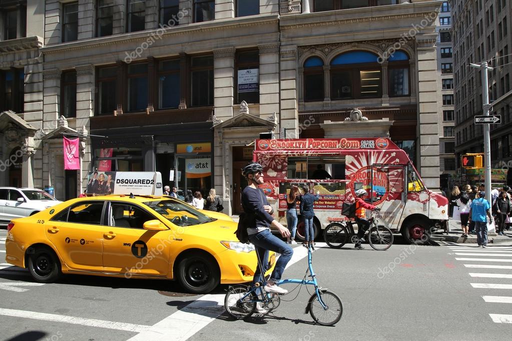 New York City Taxi and bicycle riders in Soho, Manhattan — Stock ...