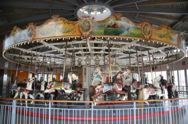 Horses on a traditional fairground B&B carousel at historic Coney Island Boardwalk