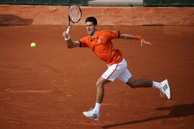 Eight times Grand Slam champion Novak Djokovic during second round match at Roland Garros 2015 clipart
