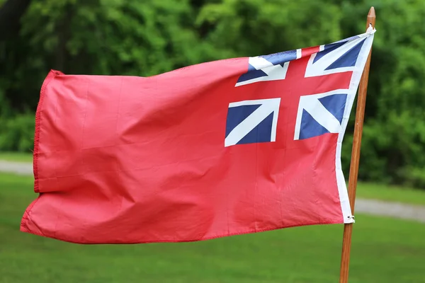 A brit kereskedelmi tengerészet piros zászló jelző polgári flotta. — Stock Fotó