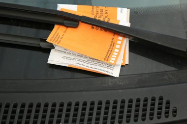 Illegal Parking Violation Citation On Car Windshield in New York clipart