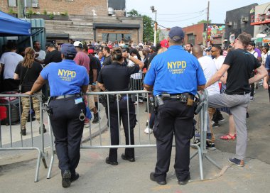 NYPD and Community Affairs officers providing security at Hip Hop concert clipart