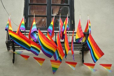  Rainbow flags outside the gay rights landmark Stonewall Inn in New York City clipart