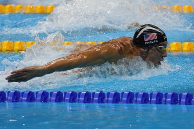Olympic champion Michael Phelps of United States swimming the Men's 200m butterfly at Rio 2016 Olympic Games  clipart