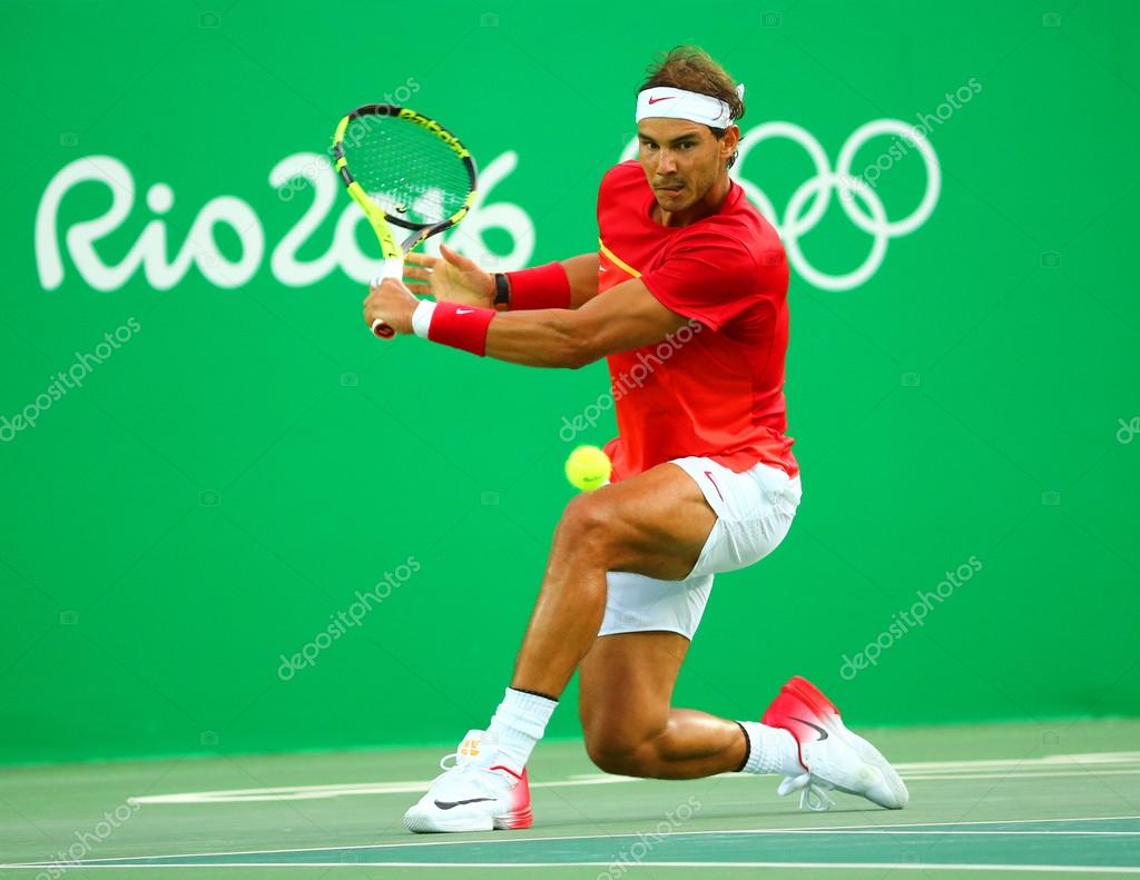 RIO DE JANEIRO, BRAZIL - AUGUST 12, 2016: Olympic champion Rafael Nadal of Spain in action during men's singles semifinal of the Rio 2016 Olympic Games at the Olympic Tennis Centre