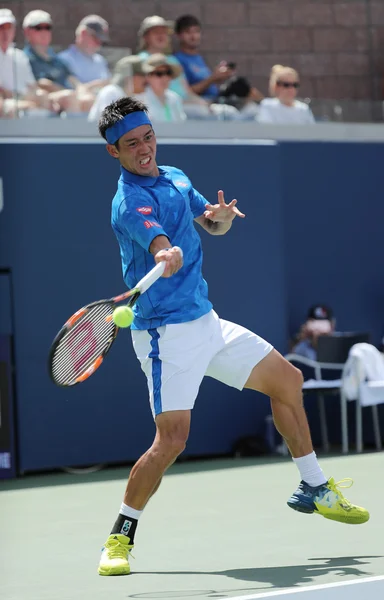 Jogador profissional de tênis Kei Nishikori do Japão em ação durante sua primeira partida no US Open 2016 — Fotografia de Stock