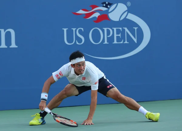 Jogador profissional de tênis Kei Nishikori do Japão em ação durante sua quarta rodada no US Open 2016 — Fotografia de Stock