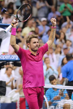 Üç kez Grand Slam şampiyonu İsviçreli Stanislas Wawrinka, Us Open 2016'daki final maçından sonra zaferini kutluyor