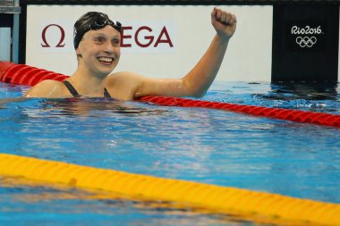 Olympic champion Katie Ledecky of United States celebrates victory at the Women's 800m freestyle of the Rio 2016 Olympic Games clipart