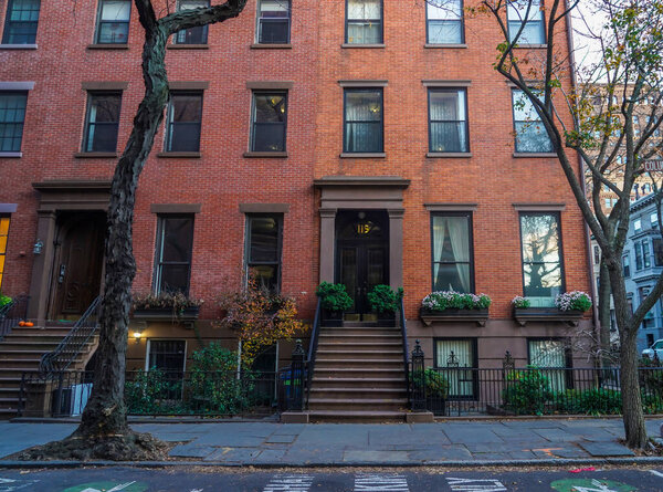 BROOKLYN, NEW YORK - NOVEMBER 29, 2020: New York City brownstones at historic Brooklyn Heights neighborhood. Brooklyn Heights is an affluent residential neighborhood within the New York City borough of Brooklyn
