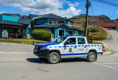 EL CHALTEN, ARGENTINA - FEBRUARY 7, 2020: Police car provides security in El Chalten, Argentinian Patagonia clipart