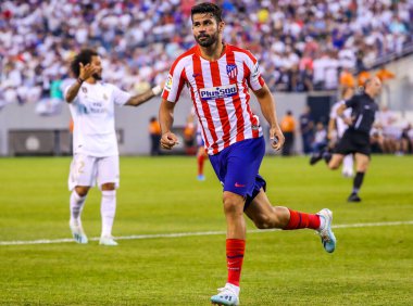 Doğu RUTHERFORD, NJ - 26 Temmuz 2019: Atletico de Madrid 'den Diego Costa, MetLife Stadyumu' nda oynanan 2019 Uluslararası Şampiyonlar Kupası 'nda Real Madrid maçında golü kutluyor. Real Madrid 3-7 yenildi