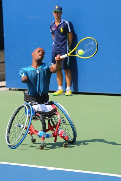 Tennis player Lucas Sithole from South Africa during US Open 2014 wheelchair quad singles match — Stock Photo, Image