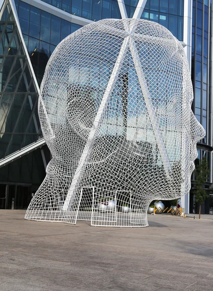 Wonderland sculpture by Jaume Plensa in the front of the Bow Tower in Calgary — Stock Photo, Image