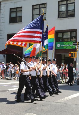 The Color Guard of the New York Police Department during at LGBT Pride Parade in New York clipart
