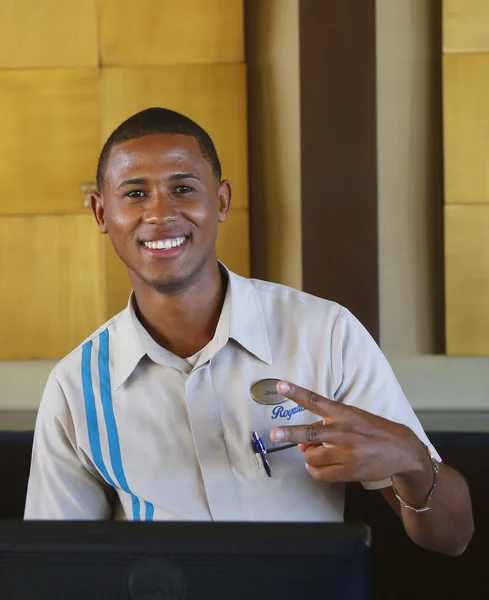 Unidentified front desk employee at Royalton All-inclusive Resort and Casino — Stock Photo, Image