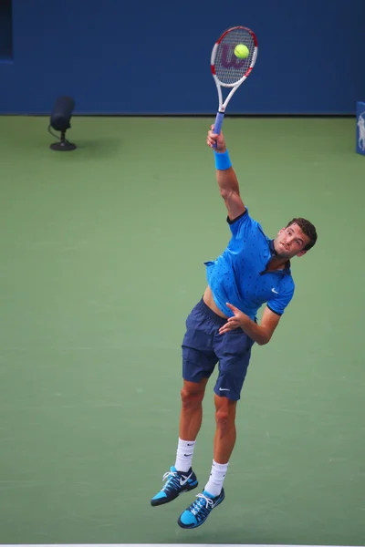 Tennisprofi Grigor Dimitrow aus Bulgarien bei den US Open 2014 in Runde 4 — Stockfoto