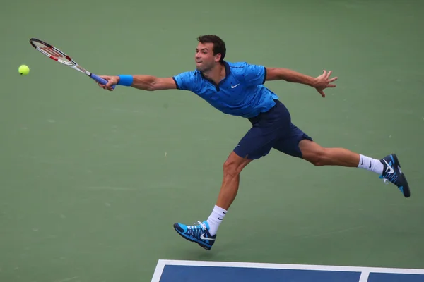 Jogador profissional de tênis Grigor Dimitrov da Bulgária durante US Open 2014 round 4 match — Fotografia de Stock