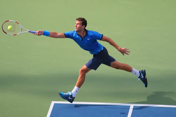 Professionele tennisspeelster Grigor Dimitrov uit Bulgarije tijdens ons Open 2014 ronde 4 wedstrijd — Stockfoto