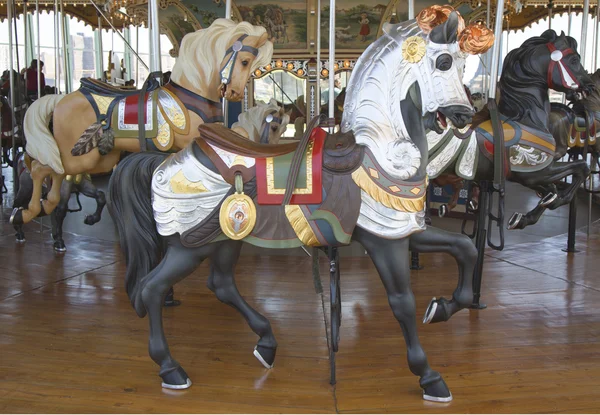 Horses on a traditional fairground Jane's carousel in Brooklyn — Stock Photo, Image