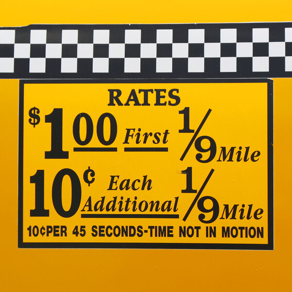 New York City taxi rates decal. This rate was in effect from April 1980 till July 1984