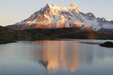 The Majestic Cuernos del Paine (Horns of Paine) reflectoion during sunrise in Lake Pehoe in Torres del Paine National Park, Patagonia, Chile clipart