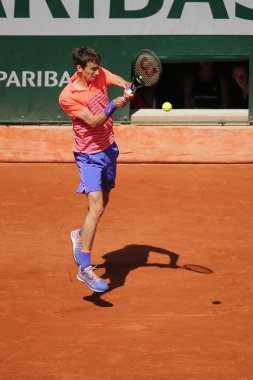 Professional tennis player Andrey Kuznetsov of Russia in action during his third round match at Roland Garros
