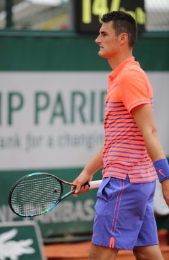 Professional tennis player Bernard Tomic of Australia in action his during first round match at Roland Garros