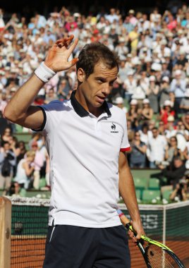 Professional tennis player Richard Gasquet of France in action during his third round match at Roland Garros 2015