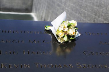Flowers left at the National September 11  Memorial at Ground Zero in Lower Manhattan