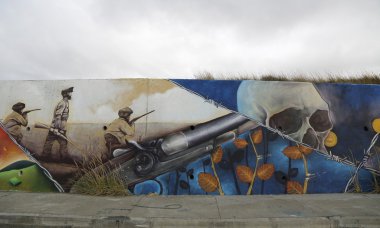 Mural art inspired by Patagonian history near Strait of Magellan ferry at Bahia Azul, Chile