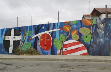 Mural art inspired by Patagonian history near Strait of Magellan ferry at Bahia Azul, Chile