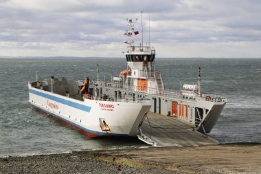 Fueguino ferry at Bahia Azul, Chile. clipart