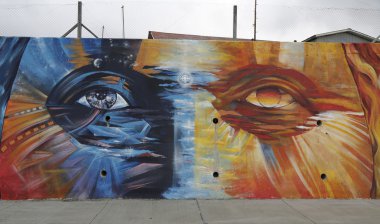 Mural art inspired by Patagonian history near Strait of Magellan ferry at Bahia Azul, Chile