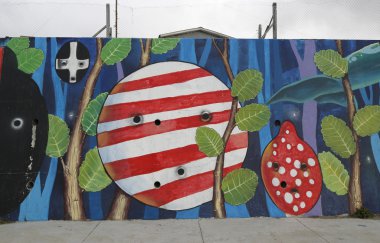 Mural art inspired by Patagonian history near Strait of Magellan ferry at Bahia Azul, Chile