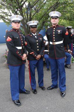 United States Marine Corps officers at Billie Jean King National Tennis Center before unfurling the American flag prior US Open 2015 men's fina