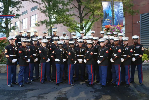 United States Marine Corps officers at Billie Jean King National Tennis Center before unfurling the American flag prior US Open 2015 men's fina — Stok fotoğraf