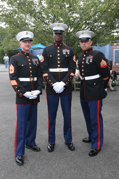 United States Marine Corps officers at Billie Jean King National Tennis Center before unfurling the American flag prior US Open 2015 men's fina — ストック写真