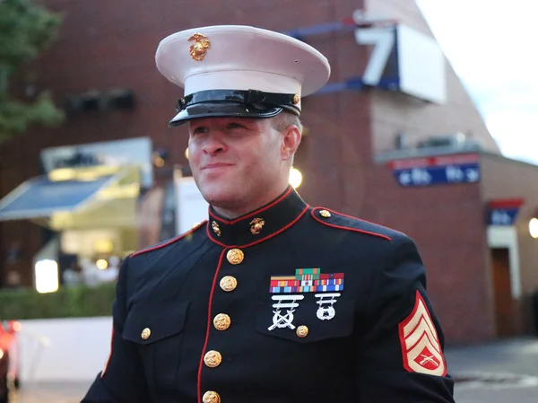 United States Marine Corps officer at Billie Jean King National Tennis Center before unfurling the American flag prior US Open 2015 men's final — ストック写真